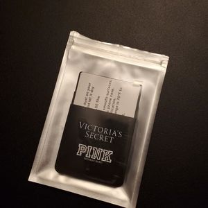 Pink adhesive credit card holder